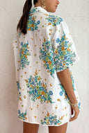 Blomsterprint elfenbensfarget kantet bluse med lommer og bakre elastisk shorts sett