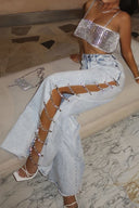 Pantaloni di jeans Y2K con spacco laterale e strass