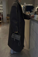 Manteau ample urbain d'hiver pour les déplacements