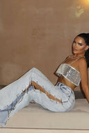 Pantaloni di jeans Y2K con spacco laterale e strass