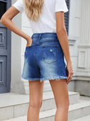 Zomerse denim shorts met franjes en distressed look