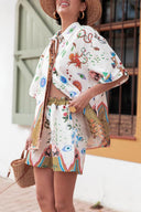 Conjunto de camisa suelta con botón de estampado único y shorts con cintura elástica y bolsillos Aad
