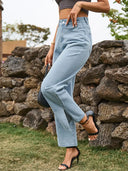 Pantalones de mezclilla lavada con abertura a la moda