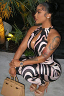 Catsuit con cuello halter y diseño en espiral inspirado en Pucci