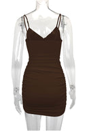 Bodycon mini-jurk met kruisbandjes en uitsnijdingen
