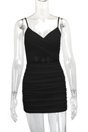 Bodycon mini-jurk met kruisbandjes en uitsnijdingen