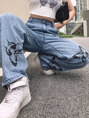 Jeans med print og slim fit