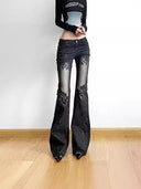 Jeans a vita bassa con motivo floreale vintage