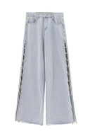 Pantaloni di jeans Y2K con spacco laterale e strass