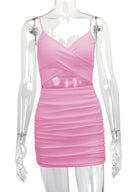 Bodycon mini-jurk met kruisbandjes en uitsnijdingen