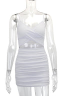 Bodycon mini-jurk met kruisbandjes en uitsnijdingen