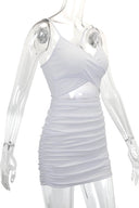 Bodycon mini-jurk met kruisbandjes en uitsnijdingen