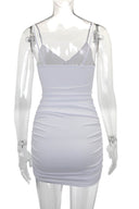 Bodycon mini-jurk met kruisbandjes en uitsnijdingen