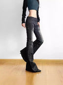 Jeans a vita bassa con motivo floreale vintage