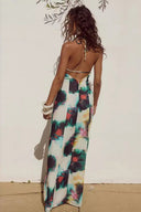 Robe longue imprimée style resort à nouer derrière le cou