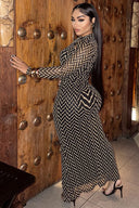 Robe longue en maille à découpes chevrons audacieuses