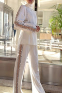 Set met broek en top met hoge hals en pailletten
