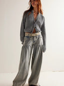 Jeans con orlo drappeggiato regolabile