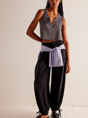 Jeans con orlo drappeggiato regolabile