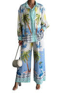 Completo pantaloni con palme ispirato alla spiaggia