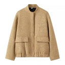 Chaqueta pequeña con cuello de pie y lentejuelas