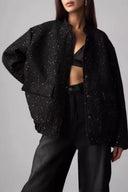 Chaqueta pequeña con cuello de pie y lentejuelas