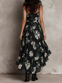 Vestido largo negro bohemio con estampado floral y tirantes irregulares sin hombros