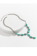 Collana con pendente a forma di anello in turchese