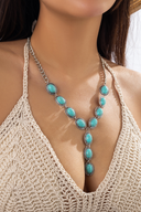 Collana con pendente a forma di anello in turchese
