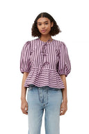 Blusa corta a righe con maniche a sbuffo, peplo e fiocchi