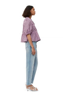 Blusa corta a righe con maniche a sbuffo, peplo e fiocchi